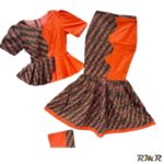 Jupe en queue de sirène bien évasé et taille basse en wax orange. (tenue africaine)